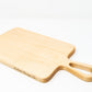 Extra small wood charcuterie board, made light blonde Maple, with smooth curves and a unique teardrop handle.