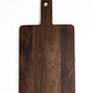 Small wood charcuterie board, made of dark Walnut, with a timeless rectangular shape and a straight handle.